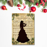 Vintage Christmas Sheet Music Girl and Violin Holiday Card<br><div class="desc">This beautiful ballet Christmas card design features a vintage Christmas sheet music design with string lights and a beautiful girl silhouette playing the violin.  The inside features a custom holiday greeting.</div>