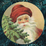 Vintage Christmas, Victorian Santa Claus with Tree Classic Round Sticker<br><div class="desc">Vintage illustration Christmas holiday design featuring a Victorian Santa Claus holding a Christmas tree,  a doll and some toys. Joyful Christmas.</div>