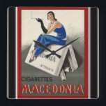 Vintage Deco Cigarette Square Wall Clock<br><div class="desc">Colorful,  clock,  featuring vintage,  Art Deco,  Macedonia cigarette advertisement.</div>