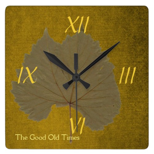 Vintage dusty grey dry leaf on yellowish brown square wall clock