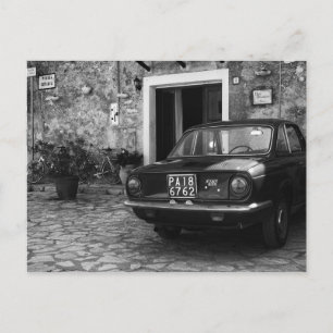 Vintage FIAT car in Italy in monochrome Postcard