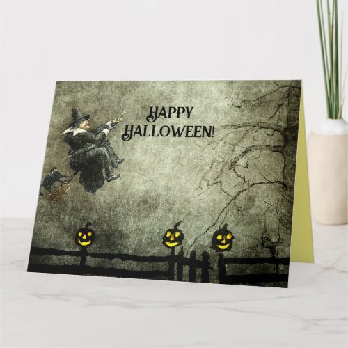 Vintage Flying Witch at Night Grinning Pumpkins Card