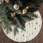 Vintage Fun Colourful Fa La Christmas String Light Brushed Polyester Tree Skirt<br><div class="desc">Add a playful retro touch to your holiday decor with this Vintage Fun Colourful Fa La Christmas String Light Pattern Christmas tree skirt. Featuring bright, whimsical string lights in a variety of festive colors, this design pops against a neutral background, creating a fun yet classic look for your Christmas tree....</div>