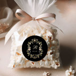 Vintage Garden Black | Colorful Wedding Monogram Classic Round Sticker<br><div class="desc">These stunning and beautiful wedding favor stickers feature an antique style,  whimsical baroque illustrated crest decorated with colorful flowers and leaves in subtle shades of peach,  pink,  purple,  green,  and neutrals on a black background. Add your monogram or initial in classic yellow cream calligraphy.</div>