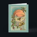 Vintage Holly, Christmas Bells and Snow Scene Holiday Card<br><div class="desc">Colorful Victorian Christmas greeting card illustration featuring brass bells,  A Merry Christmas greeting in ornate typography,  starry sky and round inset with vignette of a man carrying a Christmas tree in the snow with trees and village at sunset. Background color is customizable. Back features complementary graphics and text fields.</div>