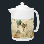 Vintage Hot Air Balloon in a Serene Landscape (1) Teapot<br><div class="desc">Elevate your space with the timeless charm of this vintage steampunk hot air balloon design. Set against a serene landscape, this artwork combines chic and shabby aesthetics with a unique touch of retro elegance. Perfect as a going-away gift, bon voyage token, or for anyone who loves the romance of hot...</div>
