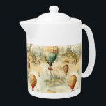 Vintage Hot Air Balloon in a Serene Landscape (4) Teapot<br><div class="desc">Elevate your space with the timeless charm of this vintage steampunk hot air balloon design. Set against a serene landscape, this artwork combines chic and shabby aesthetics with a unique touch of retro elegance. Perfect as a going-away gift, bon voyage token, or for anyone who loves the romance of hot...</div>