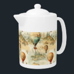 Vintage Hot Air Balloon in a Serene Landscape (4) Teapot<br><div class="desc">Elevate your space with the timeless charm of this vintage steampunk hot air balloon design. Set against a serene landscape, this artwork combines chic and shabby aesthetics with a unique touch of retro elegance. Perfect as a going-away gift, bon voyage token, or for anyone who loves the romance of hot...</div>