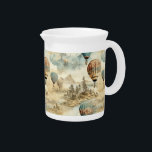 Vintage Hot Air Balloon in a Serene Landscape (7) Beverage Pitcher<br><div class="desc">Share the beauty and joy of exploration with this hot air balloon pitcher. It's a tribute to the boundless spirit of adventure,  perfect for those who appreciate the beauty of the journey. Order yours now!</div>