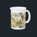 Vintage Hot Air Balloon in a Serene Landscape (7) Beverage Pitcher<br><div class="desc">Share the beauty and joy of exploration with this hot air balloon pitcher. It's a tribute to the boundless spirit of adventure,  perfect for those who appreciate the beauty of the journey. Order yours now!</div>