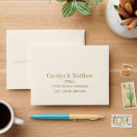 Vintage Ivory and Antique Gold Flourish Wedding Envelope<br><div class="desc">Custom A2 wedding response envelopes feature formal style antique gold reply-to address text with scroll and ivory (can be customized) background color.</div>