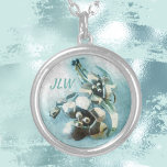 Vintage Lily Brooch Pastel Blue Silver Plated Necklace<br><div class="desc">Customize this beautiful floral pendant necklace with her initials for a truly elegant gift she will treasure. The image in pastel blue is of a vintage metal brooch of a pair of lilies and is ultra feminine and unique.

This image is original jewelry photography of JLW_Photography.</div>
