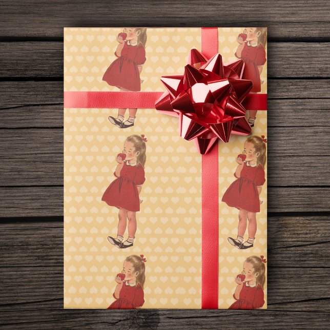 Vintage Little Girl Red Dress Apple Wrapping Paper (Little vintage girl red dress eating red apple on hearts on yellow gift wrapping paper roll.)