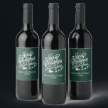 Vintage Merry Christmas Happy New Year Dark Green Wine Label<br><div class="desc">Christmas family monogram wine labels features your family name and year in stylish typography with a pretty hand drawn vintage Merry Christmas and Happy New Year image on a dark green background. Simply add your name and year. Exclusively designed for you by Happy Dolphin Studio. If you need any help...</div>