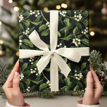 Vintage Mistletoe on Black Christmas  Wrapping Paper<br><div class="desc">Elevate your gift-giving with this Vintage Mistletoe Christmas Wrapping Paper, featuring a realistic mistletoe pattern on a striking black background. This festive and elegant design blends vintage charm with a modern twist, perfect for adding a touch of sophistication to your holiday presents. Ideal for those who love a classic Christmas...</div>