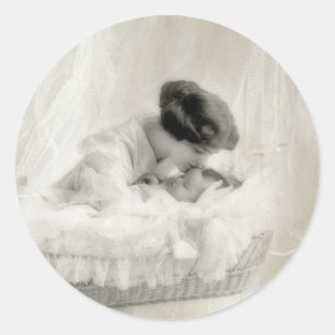 Vintage Mother Kissing Baby in Bassinet Classic Round Sticker