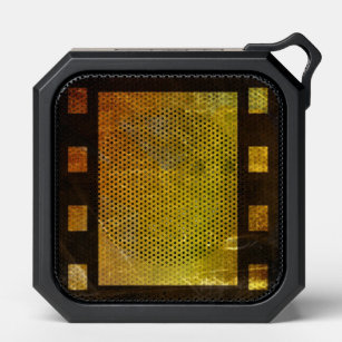 Vintage movie reel film black, yellow bluetooth speaker