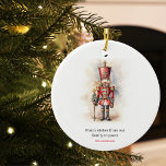 Vintage Nutcracker & Merry Christmas Ceramic Ornament<br><div class="desc">A beautifully illustrated vintage-style Nutcracker soldier, resplendent in his classic attire, stands tall, holding a Merry Christmas banner. The rich, warm colors and intricate details evoke a sense of yuletide nostalgia, making it a perfect choice for those who appreciate the classic holiday aesthetics. May your holiday season be filled with...</div>