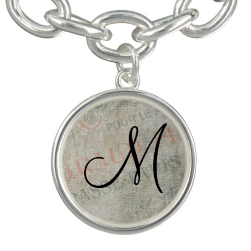 Vintage Parisian Advertisement with Monogram Charm Bracelet