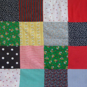 vintage patterned squares of colorful patchwork pouf