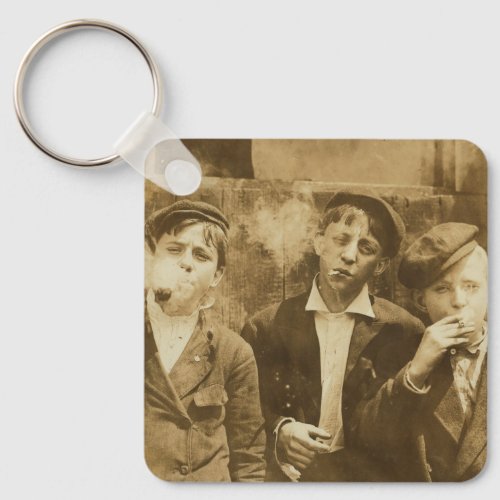 Vintage photograph of newsies smoking cigars  keychain