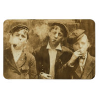 Vintage photograph of newsies smoking cigars
