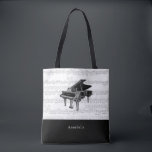 Vintage Piano Music Scores Black & White Tote Bag<br><div class="desc">This simple and elegant personalized tote bag features your name on a black block and a vintage piano with vintage music scores on a white block. Perfect for pianists, piano instructors, music teachers, musicians, and music lovers. Change the background color and personalize it for your needs. You can find matching...</div>