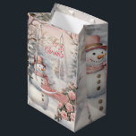 Vintage Pink Roses, Snowman Christmas Village Medium Gift Bag<br><div class="desc">Enjoy Christmas in the village style with our PERSONALIZED Vintage Pink Roses, Snowman Christmas Village Gift Bag and Merry Christmas script. Send those gifts in style with our retro theme. Make the gift bag unique by customizing it with your message and name. Get yours today for Christmas. This gift wrap...</div>