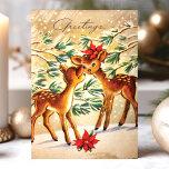 Vintage Poinsettia Deer In Snow Christmas Holiday Card<br><div class="desc">Vintage Poinsettia Deer In Snow Christmas Holiday Card. This design features two deer in the snow with poinsettia flowers. What a beautiful retro holiday scene. Personalize this custom design with your own inside greeting.</div>