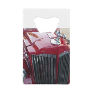 vintage red car with chrome hood ornament credit card bottle opener