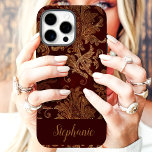 Vintage Red Gold Damask Custom Name iPhone 16 Pro Max Case<br><div class="desc">Embrace timeless elegance with this Vintage Red & Gold Damask Monogram iPhone Case. This luxurious design features an intricate damask pattern in rich red and gold hues, reminiscent of opulent tapestries and antique décor. Personalize it with your monogram for a touch of bespoke charm. Perfect for those who appreciate classic...</div>