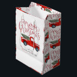 Vintage Red Truck Personalized Christmas Gift Bag<br><div class="desc">Give your gift that perfect finishing touch with our Christmas gift bags. Whether you're headed to an office secret santa or hosting a holiday party of your own, these gift bags will be sure to make a statement. Our Christmas gift bags can be personalized with the hosts' names and party...</div>