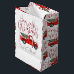 Vintage Red Truck Personalized Christmas Gift Bag<br><div class="desc">Give your gift that perfect finishing touch with our Christmas gift bags. Whether you're headed to an office secret santa or hosting a holiday party of your own, these gift bags will be sure to make a statement. Our Christmas gift bags can be personalized with the hosts' names and party...</div>