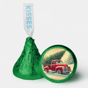 Vintage red truck with Christmas tree Hershey®'s Kisses®