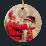 Vintage Santa Claus Snowman Christmas Ceramic Ornament<br><div class="desc">This design features a jovial Santa Claus and snowman in the snow. 
 #christmas #santa #cute #decoration</div>