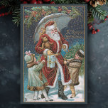 Vintage Santa in Snow with Children & Umbrella Tissue Paper<br><div class="desc">Beautiful and colorful restored vintage Christmas scene featuring red-robed Santa walking in the snow at night with his arms full of gifts and holding an umbrella while two children tug at his robes. Midnight blue background with decorative holly border and gold highlights. Background color can be changed.</div>