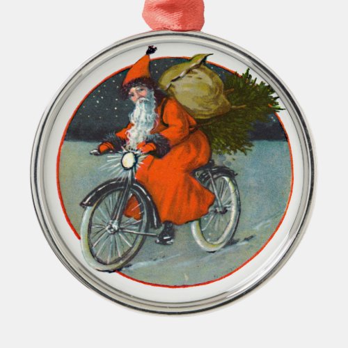 Vintage santa riding an old bicycle ornament