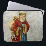 Vintage Style Father Christmas Santa Claus Laptop Sleeve<br><div class="desc">A vintage image of the classic Father Christmas wearing his famous red coat and carrying a bag full of toys. This old-fashioned Santa Claus also known as old Saint Nicholas is slim and holds a walking stick for travelling throughout the land gifting toys to all the girls and boys. The...</div>