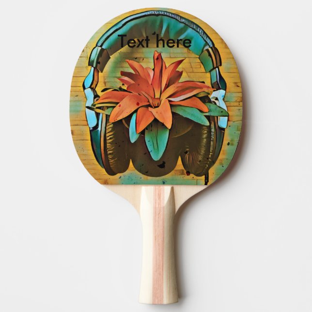 Vintage-style headphone on plant ping pong paddle (Front)