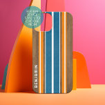 Vintage Surfboard Stripes - Custom Name iPhone 16 Case<br><div class="desc">A colorful, retro stripe design in blue and orange on a faux wood print background. A vintage surfboard stripe design with a beach and surf look. Add your name or monogram to make this a personal phone case that will stand out amongst your friends. The name is a thin serif...</div>