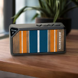 Vintage Surfboard Stripes - Subtle Wood Background Bluetooth Speaker<br><div class="desc">A colorful,  retro stripe design in blue and orange on a faux wood print background. A vintage surfboard stripe design with a beach and surf look. Add your name or monogram to make this a personal speaker that will stand out amongst your friends. The name is a retro font.</div>