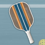 Vintage Surfboard Stripes - Subtle Wood Background Pickleball Paddle<br><div class="desc">A colorful, retro stripe design in blue and orange on a faux wood print background. A vintage surfboard stripe design with a beach and surf look. Add your name or monogram to make this a personal paddle that will stand out amongst your friends. The name is a thin sans serif...</div>