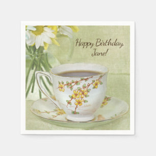 vintage teacup with daisy bouquet napkins