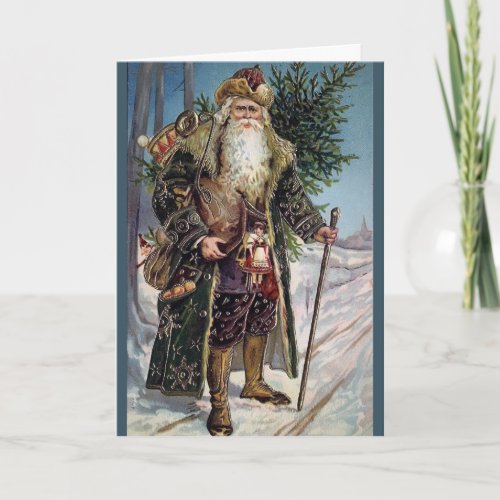 Vintage traditional blue coat Santa greeting card