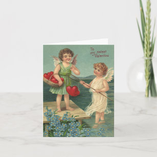 https://rlv.zcache.com/vintage_valentines_day_angels_fishing_for_hearts_holiday_card-rc865cf1e69294ef8b0637ebec8607171_udffa_307.jpg
