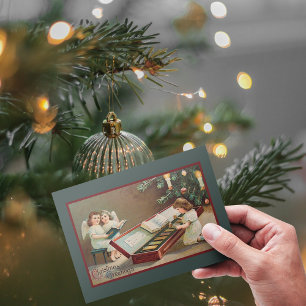 Vintage Victorian Baby Angels Playing Christmas Holiday Postcard
