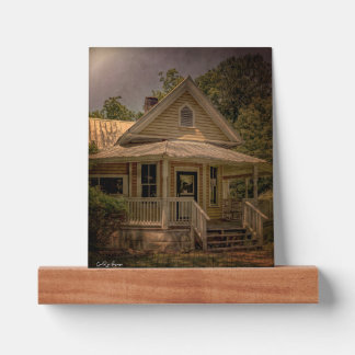 Vintage Wooden House With Porch on a Sunny Day Picture Ledge