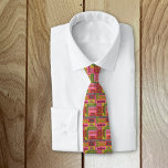 Vintage Word Collage 1970s Style Christmas Pattern Neck Tie<br><div class="desc">Add a vintage touch to your Christmas look this year with this retro style necktie. It features a collage of Christmas greetings and sayings in a seventies style color palette of pink,  orange,  red,  green and lime green. The reverse side has a coordinating geometric print.</div>