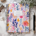 Vivid Hand Painted Botanical Blue Monogram 2025 Planner<br><div class="desc">Personalize this whimsical planner with your name in navy blue italics framed by a white rectangle,  on a bold,  colorful background of hand-painted floral and botanical elements in shades of blue,  pink and orange.</div>