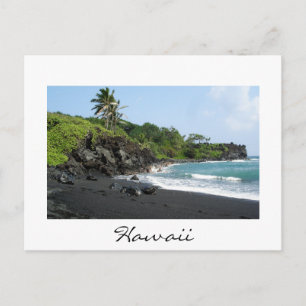 Volcanic black sand beach on Hawaii white postcard